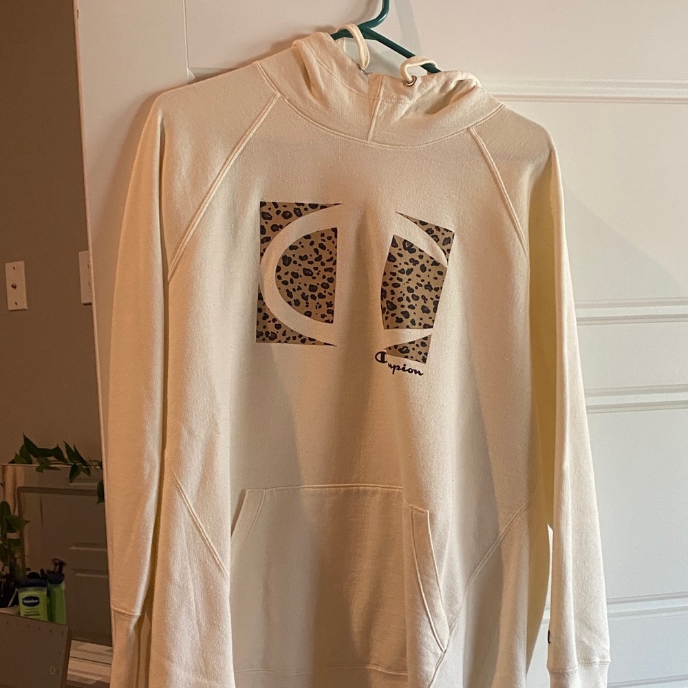 Champion Cream Sweater with Leopard Accents